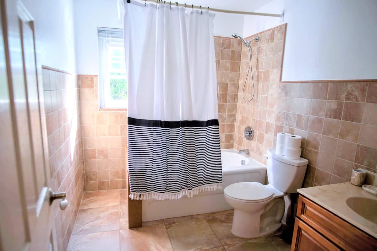 Second bathroom with bathtub