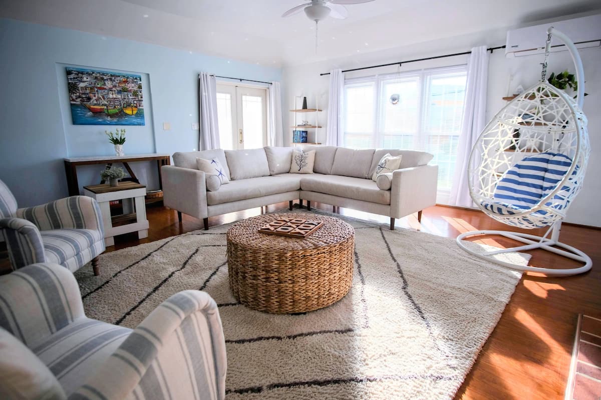 Seven Arches — living room with hanging chair